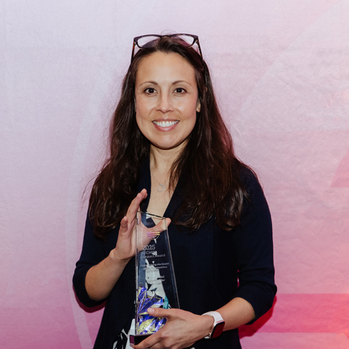 Lummi-Impact-square 2025 Learning Forum Impact Award Winner holding award